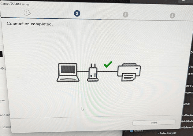 Canon printer setup screen showing connection completed