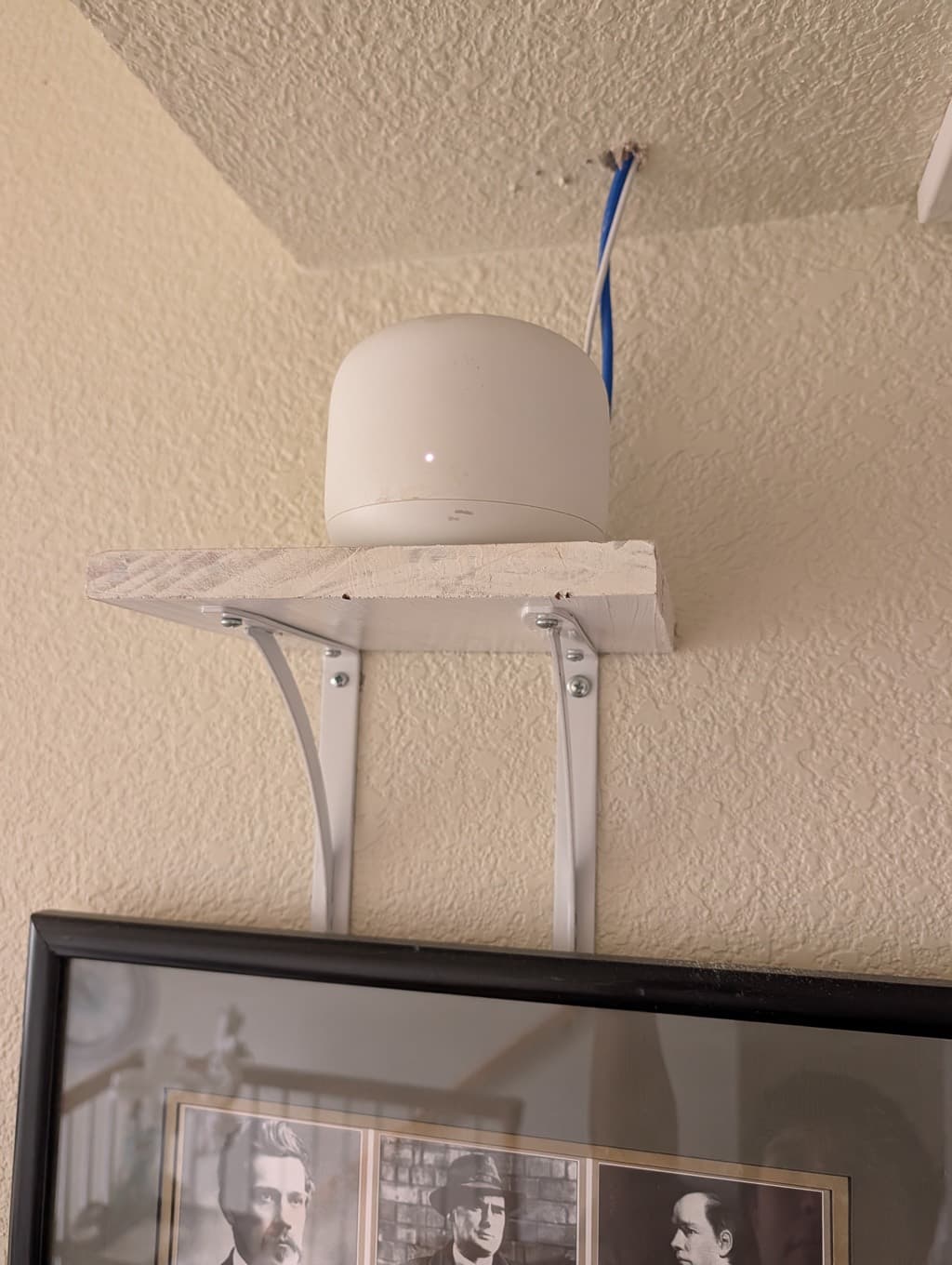 Nest Wi-Fi point placed on a high shelf for whole-home coverage