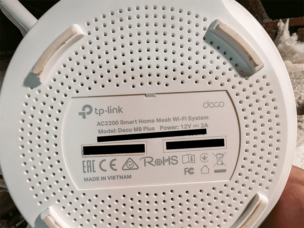 Mesh Wi-Fi unit installed to cover a dead zone in a house